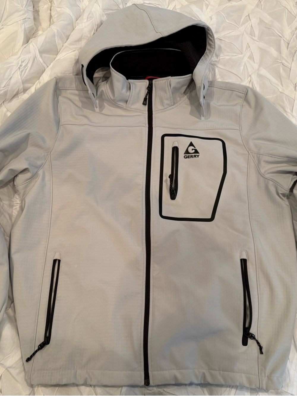 Gerry white Hooded Softshell with Black Trim.  Fleece lined.